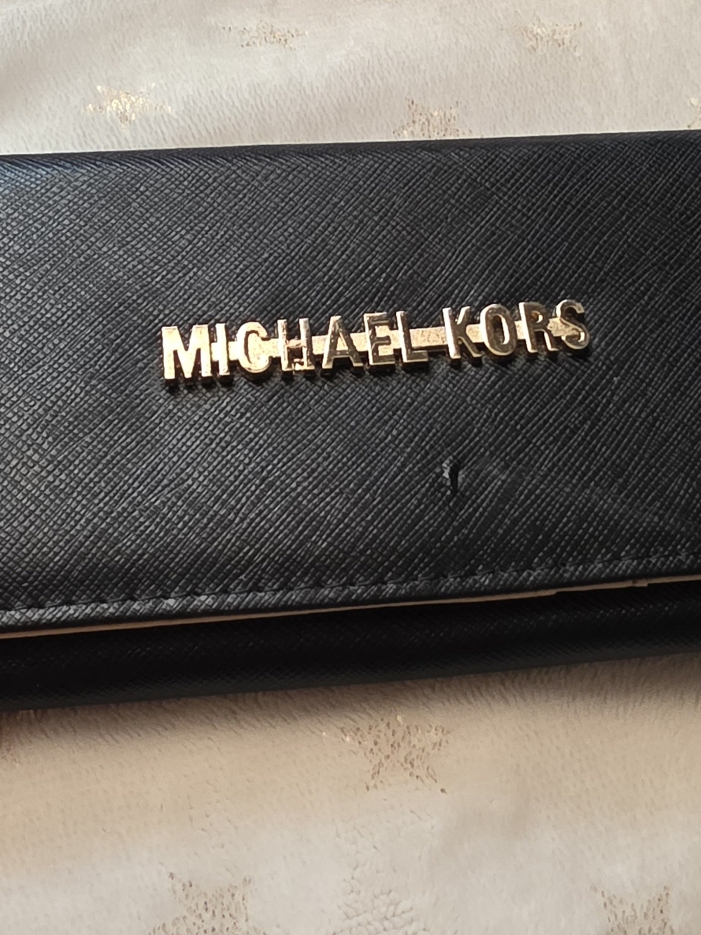 Black Wallet with Gold Logo